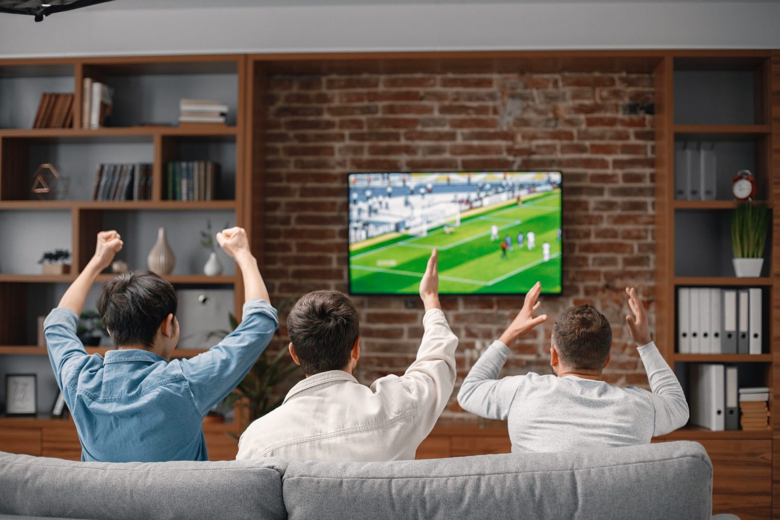 Multiple screens running sport in a commercial venue